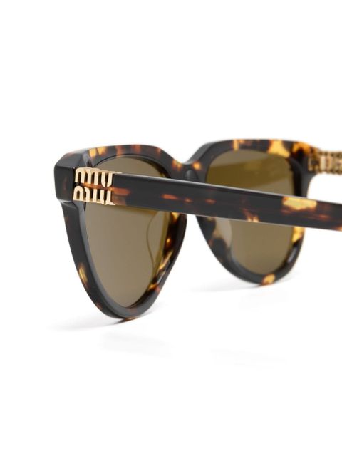 Miu Miu Eyewear tortoiseshell-effect round sunglasses - Brown