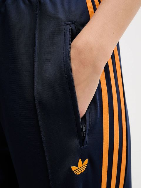 adidas Originals spodnie dresowe Firebird damskie kolor granatowy wzorzyste JW1229