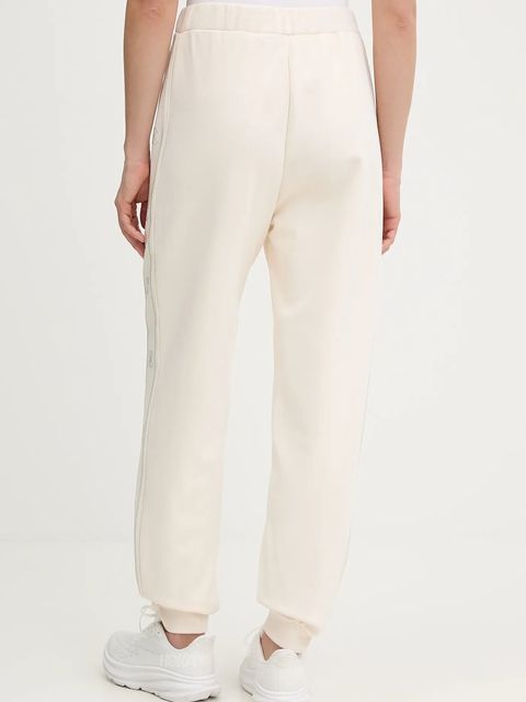 Guess spodnie dresowe OCTAVIA damskie kolor beżowy z aplikacją V5BB23 KCX22