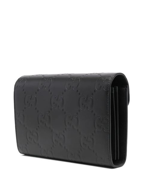 Gucci debossed G monogram crossbody bag - Black
