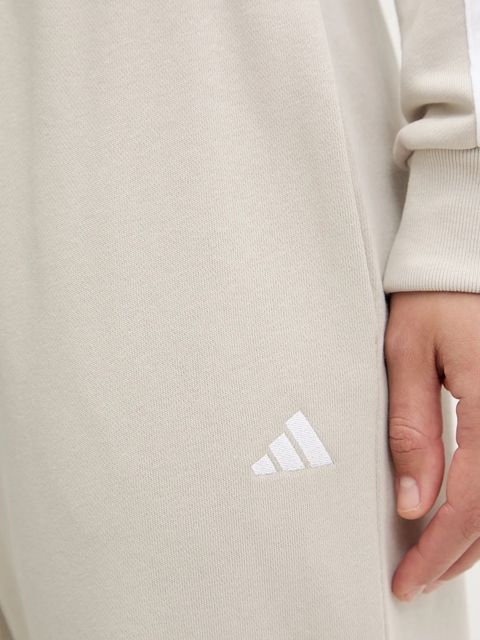 adidas spodnie dresowe Essentials damskie kolor beżowy gładkie JC8305