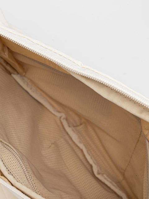 The North Face torebka Never Stop Crossbody kolor beżowy NF0A81DSQLI1