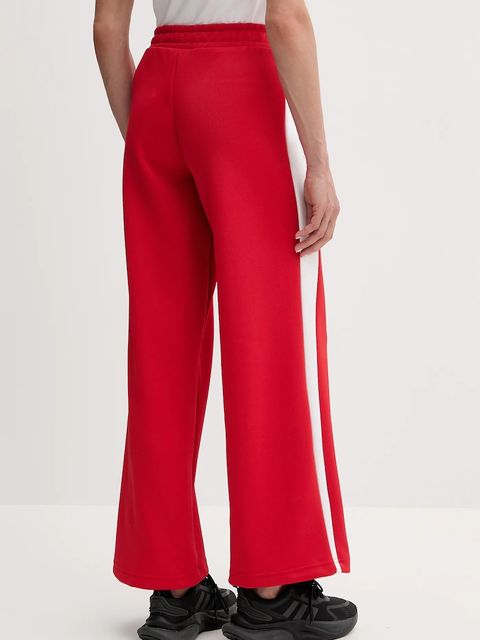 Puma spodnie dresowe damskie kolor czerwony 629803