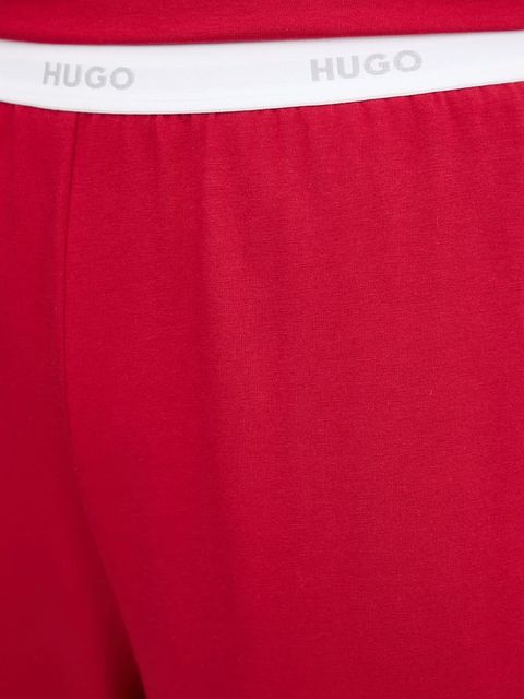HUGO spodnie lounge damskie kolor czerwony gładkie 50555624 - zdjęcie produktu nr 2