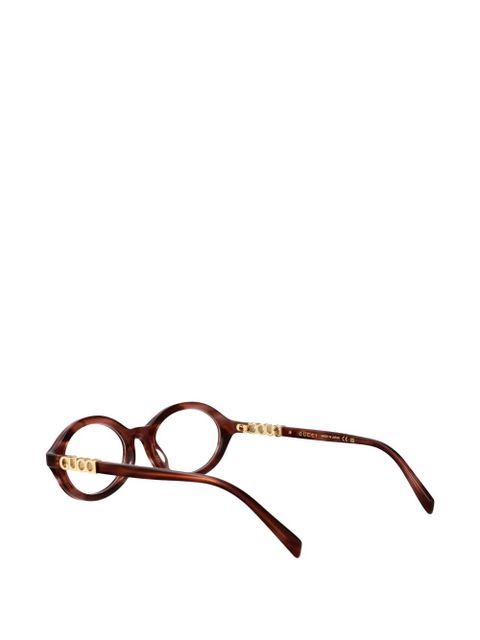 Gucci Eyewear logo-plaque round-frame glasses - Brown