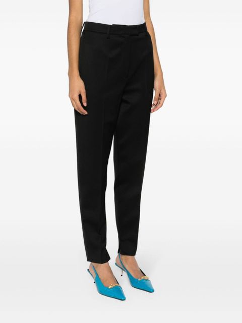 Prada pressed-crease tapered-leg trousers - Black