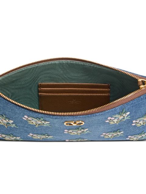 Valentino Garavani Vlogo Signature clutch bag in denim with floral embroidery - Blue