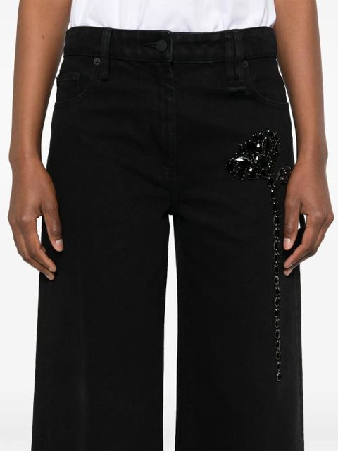 Simone Rocha Carnation-embellished jeans - Black