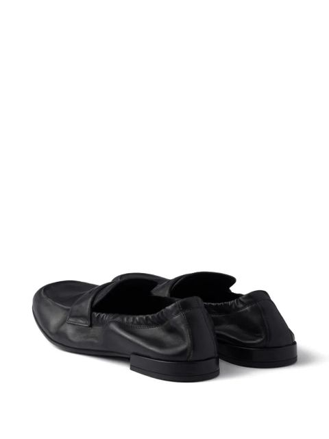 Prada Shuffle antiqued screen-printed-logo loafers - Black