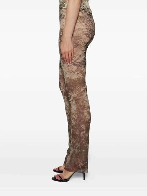 Jean Paul Gaultier medallion-print trousers - Neutrals