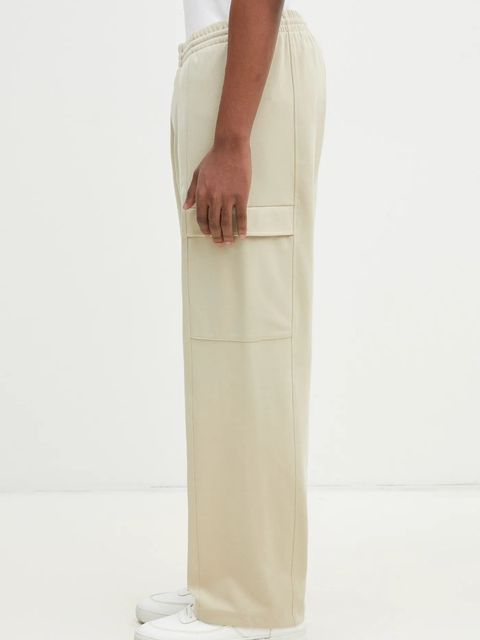 Pangaia spodnie dresowe kolor beżowy gładkie 10002239