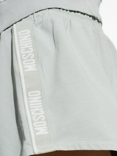 Moschino logo-tape curved-hem shorts - Blue
