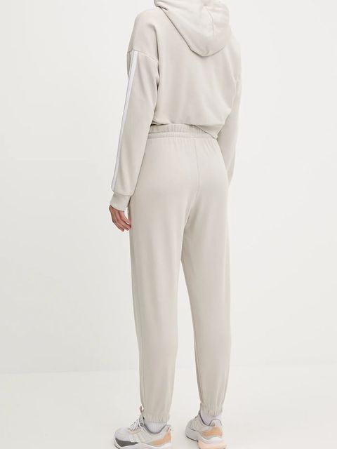 adidas spodnie dresowe Essentials damskie kolor beżowy gładkie JC8305