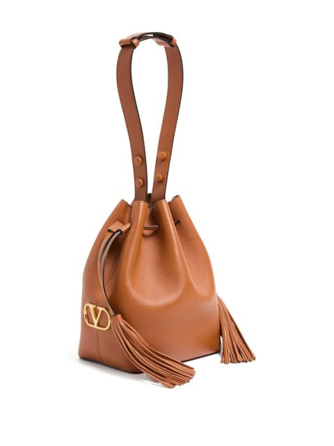 Valentino Garavani medium tassel logo bucket bag - Brown