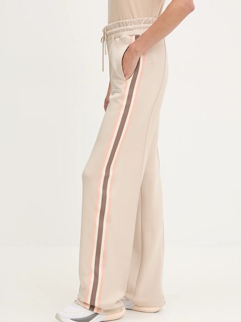 Guess spodnie dresowe YARROW damskie kolor beżowy z nadrukiem V5GB12 KCRU2