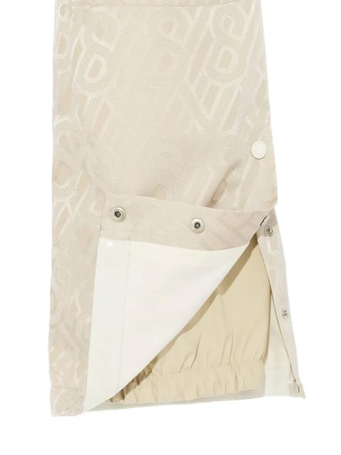 Yves Salomon monogram-pattern snow trousers - Neutrals
