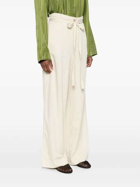 TOTEME belted-waist flared trousers - Neutrals