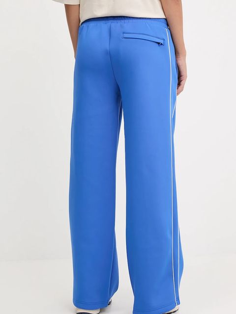 Puma spodnie dresowe bawełniane damskie kolor niebieski gładkie 632332