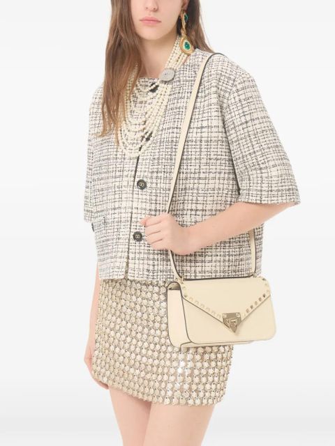 Valentino Garavani Rockstud small shoulder bag in grainy calfskin - Neutrals