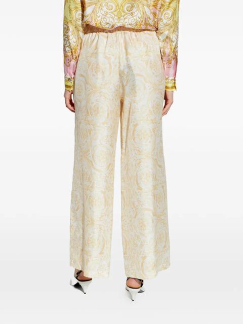 Versace floral-patterned trousers - White