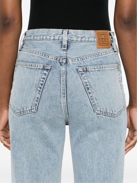 TOTEME logo-patch cotton jeans - Blue