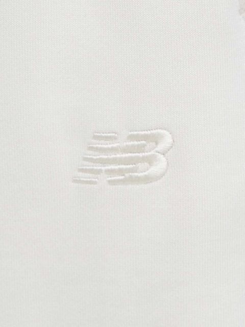 New Balance spodnie dresowe bawełniane WP41513LIN