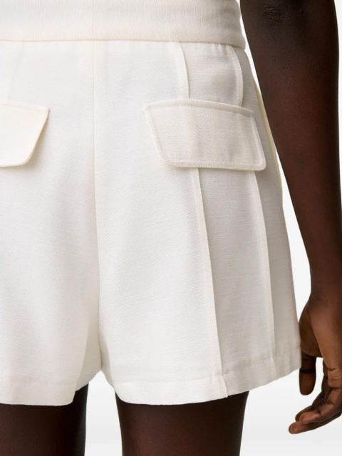 Claudie Pierlot button-fastening pleated shorts - White