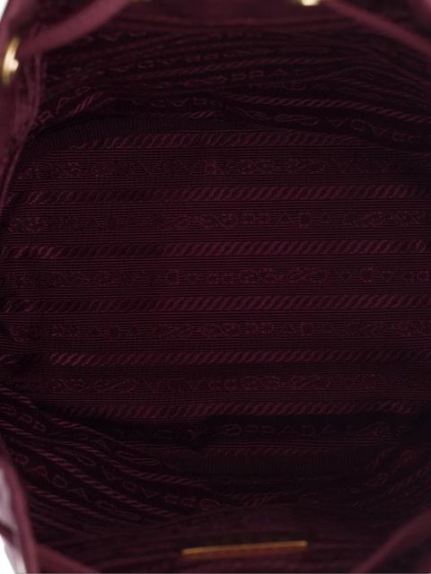 Prada drawstring metal-logo bucket bag - Red