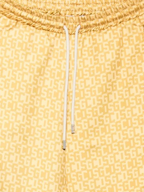 GCDS logo-print drawstring track pants - Yellow