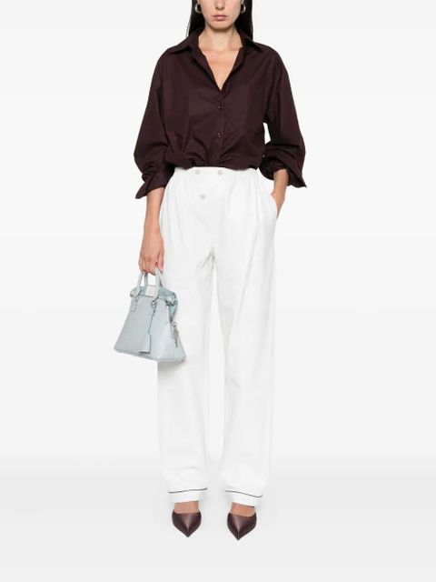 Prada button-fastening cupro trousers - White