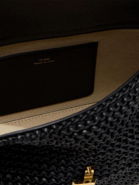 TOTEME T-lock woven leather clutch bag - Black