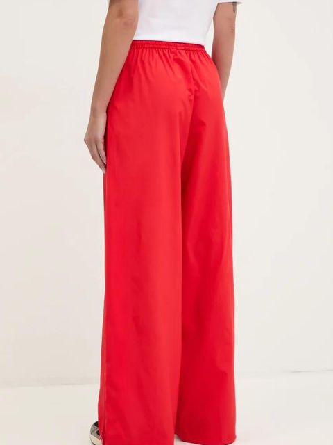 adidas Originals spodnie dresowe WOVEN TP damskie kolor czerwony gładkie JX9205