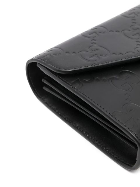 Gucci debossed G monogram crossbody bag - Black