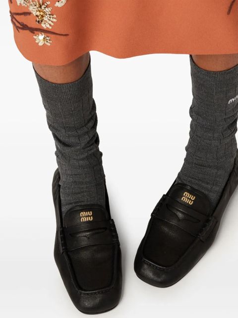Miu Miu embossed-logo loafers - Black