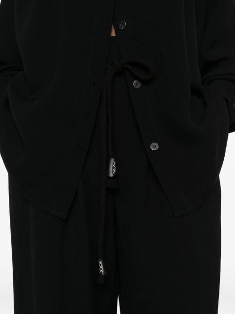 Nanushka high-waist belt trousers - Black