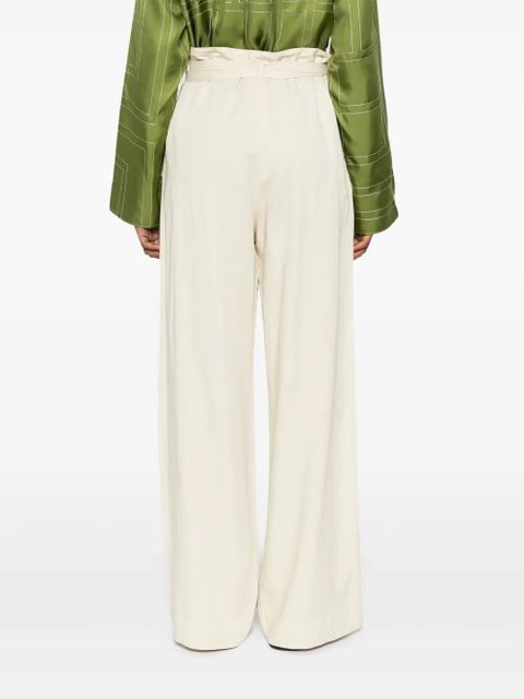 TOTEME belted-waist flared trousers - Neutrals