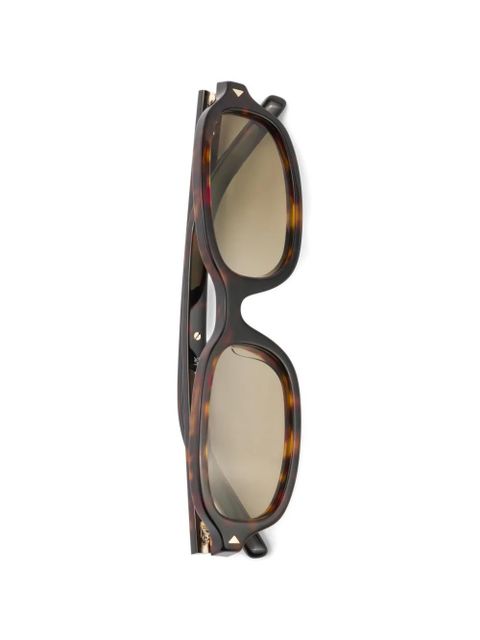 Prada Eyewear sunglasses with the iconic metal plaque - Brown