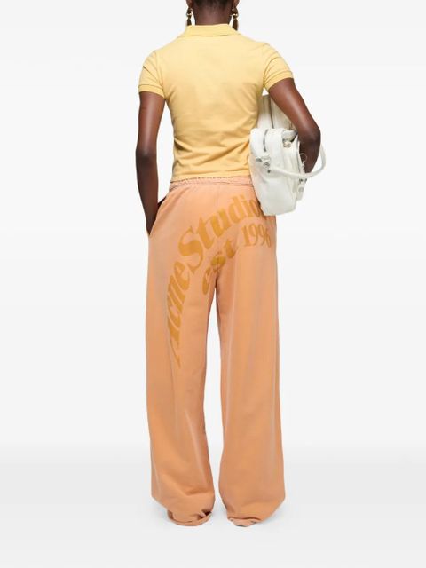 Acne Studios buttoned logo polo shirt - Yellow