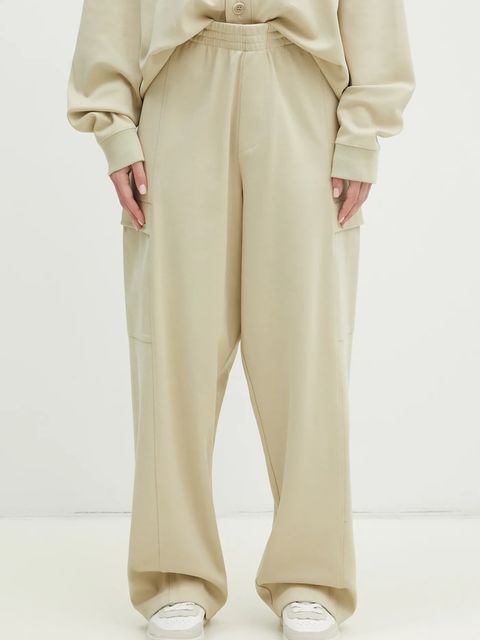 Pangaia spodnie dresowe kolor beżowy gładkie 10002239