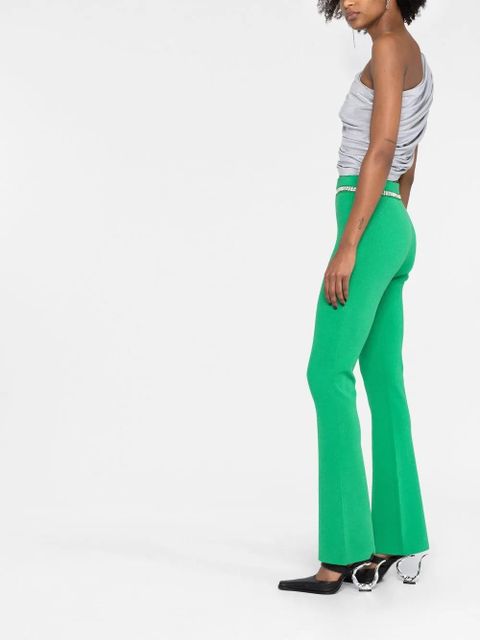 Rabanne rhinestone-embellished ribbed-knit flared trousers - Green