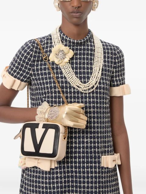 Valentino Garavani logo-embellished crossbody bag - White