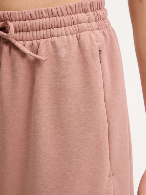 adidas Performance spodnie dresowe Designed for Training damskie kolor pomarańczowy gładkie JN7176