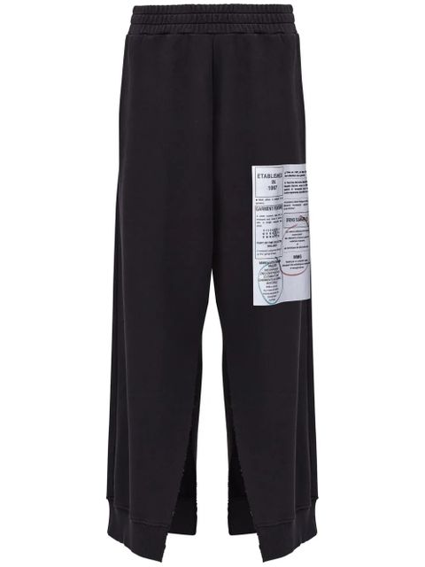 MM6 Maison Margiela numbers-motif flared trousers - Black - zdjęcie produktu nr 1