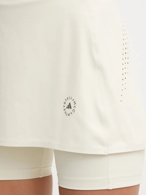 adidas by Stella McCartney sukienka sportowa TruePurpose kolor beżowy mini rozkloszowana JM1409