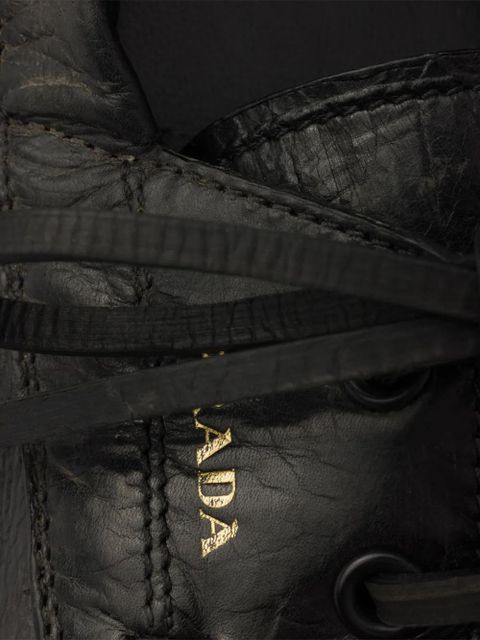 Prada shuffle antiqued-leather boat shoes - Black