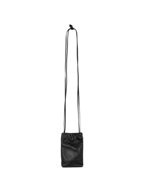 The Row logo-debossed leather crossbody bag - Black