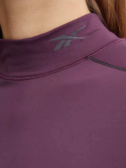 Reebok longsleeve treningowy kolor fioletowy z półgolfem 100205683
