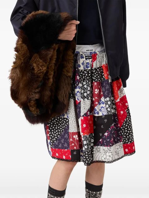 Miu Miu patchwork logo-detail mini skirt - Red