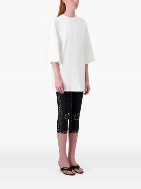 Coperni mantra-print cycling trousers - Black