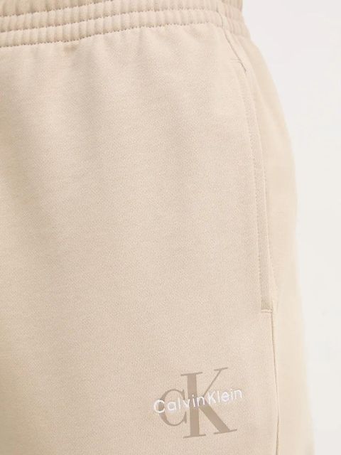 Calvin Klein Jeans spodnie dresowe damskie kolor beżowy gładkie LV047B235G